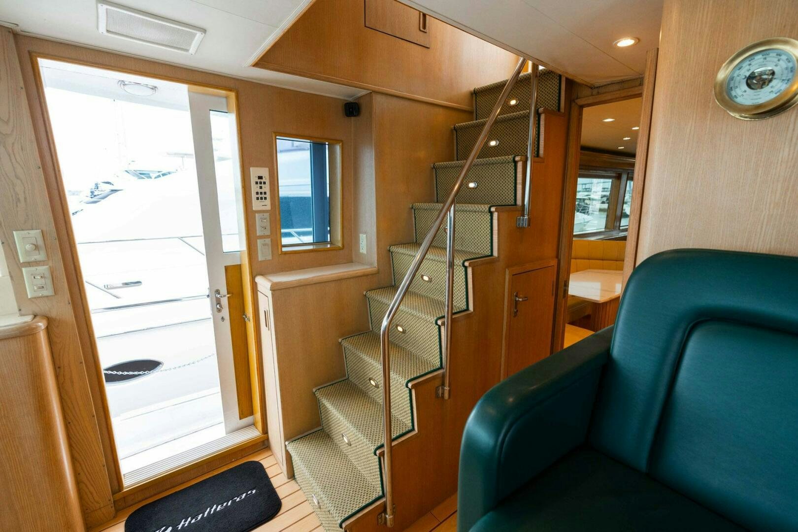 a room with a couch and a ladder aboard KRAKEN Yacht for Sale