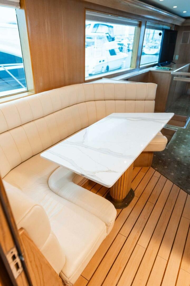 a room with a bed and a window aboard KRAKEN Yacht for Sale