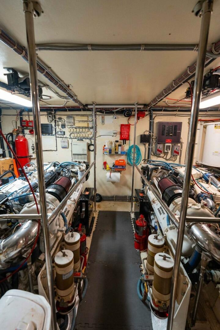 a room with many pipes and equipment aboard KRAKEN Yacht for Sale