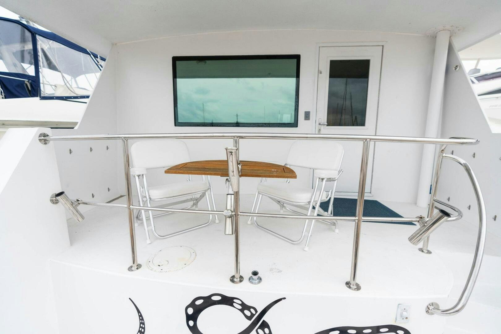 a table with a screen aboard KRAKEN Yacht for Sale