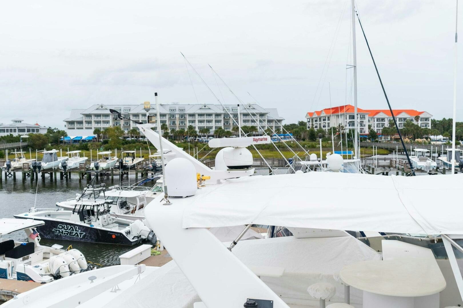 a group of boats are parked in a harbor aboard KRAKEN Yacht for Sale