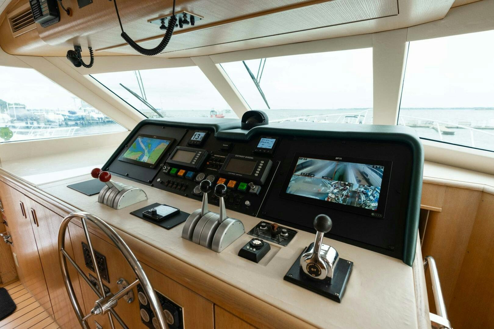 a desk with a computer and other electronics on it aboard KRAKEN Yacht for Sale