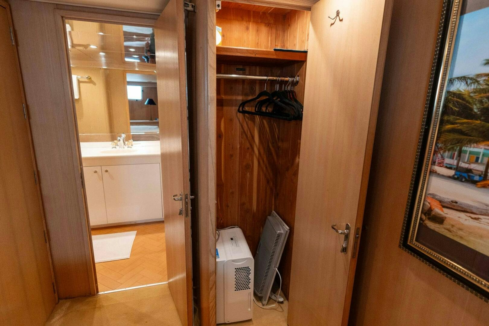 a room with a sink and a mirror aboard KRAKEN Yacht for Sale