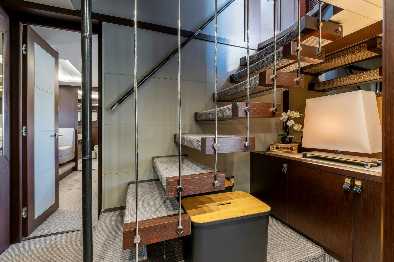 a room with a bunk bed and a desk aboard INSOMNIA Yacht for Sale