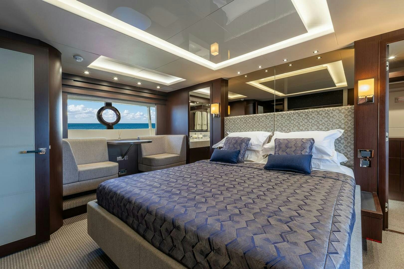 a bed in a room aboard INSOMNIA Yacht for Sale