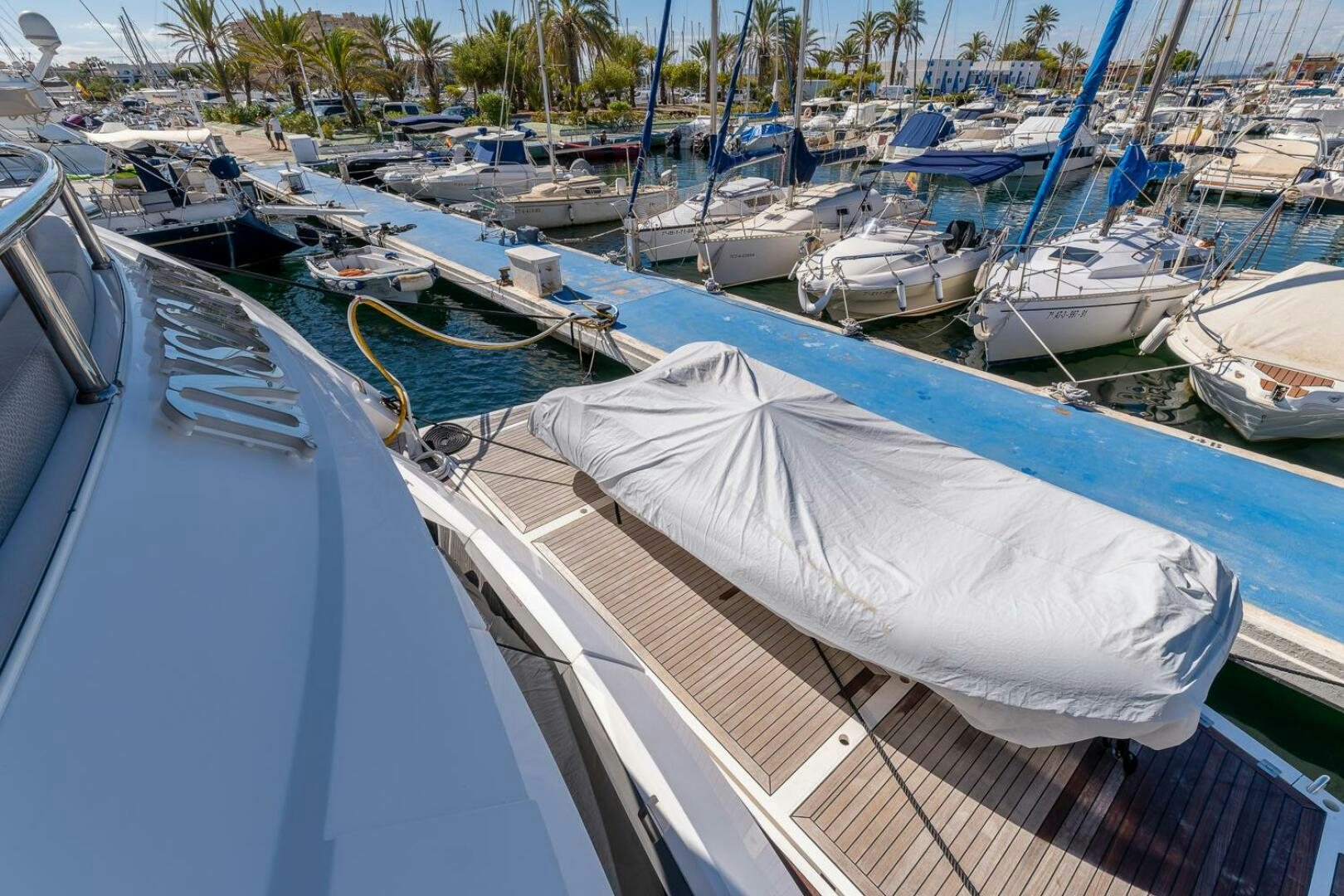 a bunch of boats are parked in a harbor aboard INSOMNIA Yacht for Sale