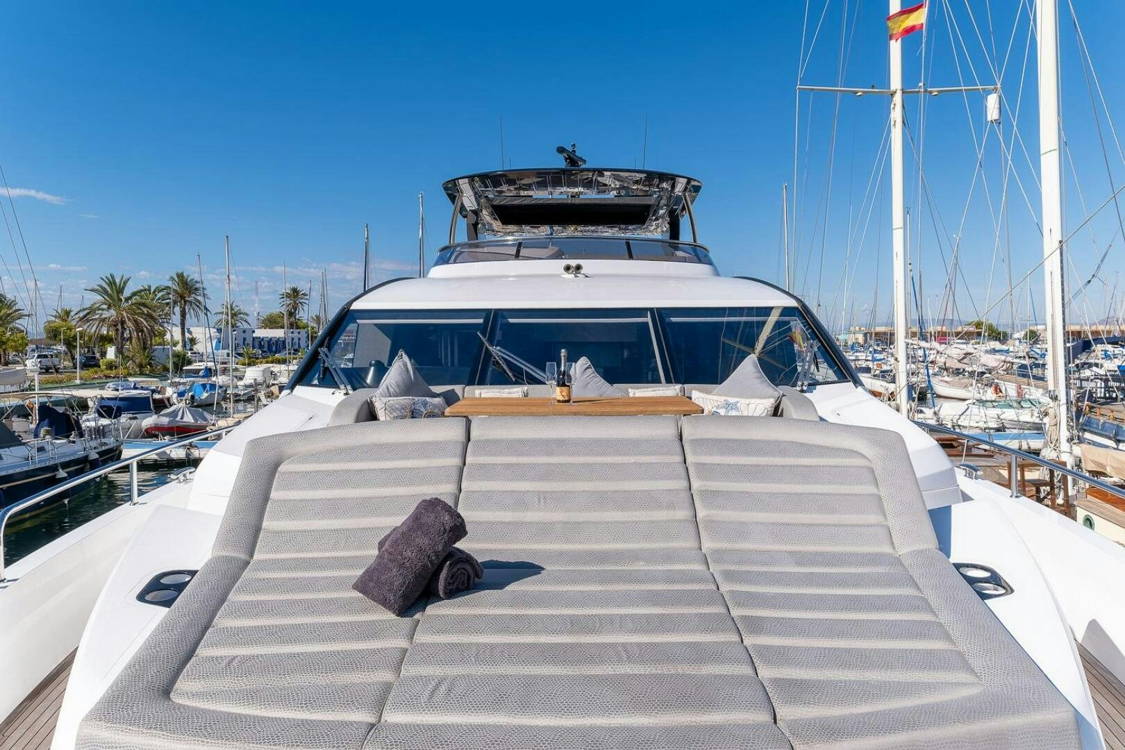 a boat parked on a dock aboard INSOMNIA Yacht for Sale