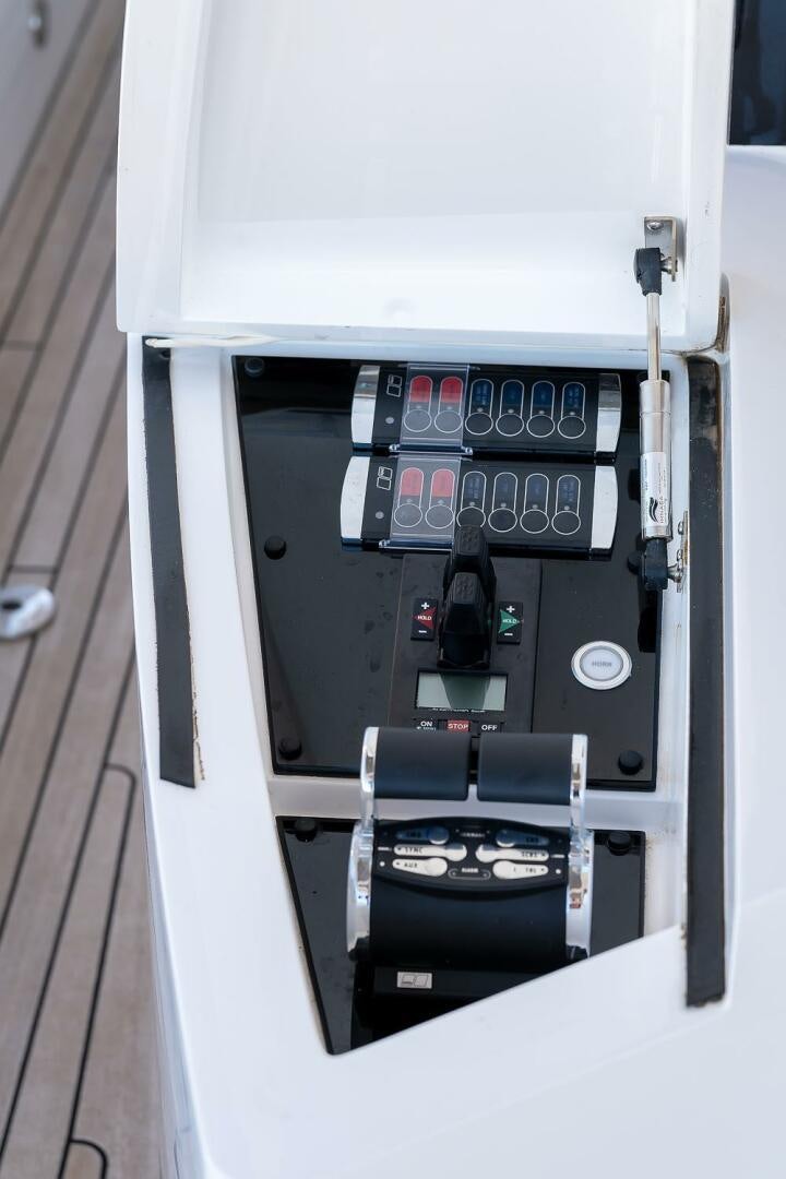 a black and silver computer aboard INSOMNIA Yacht for Sale