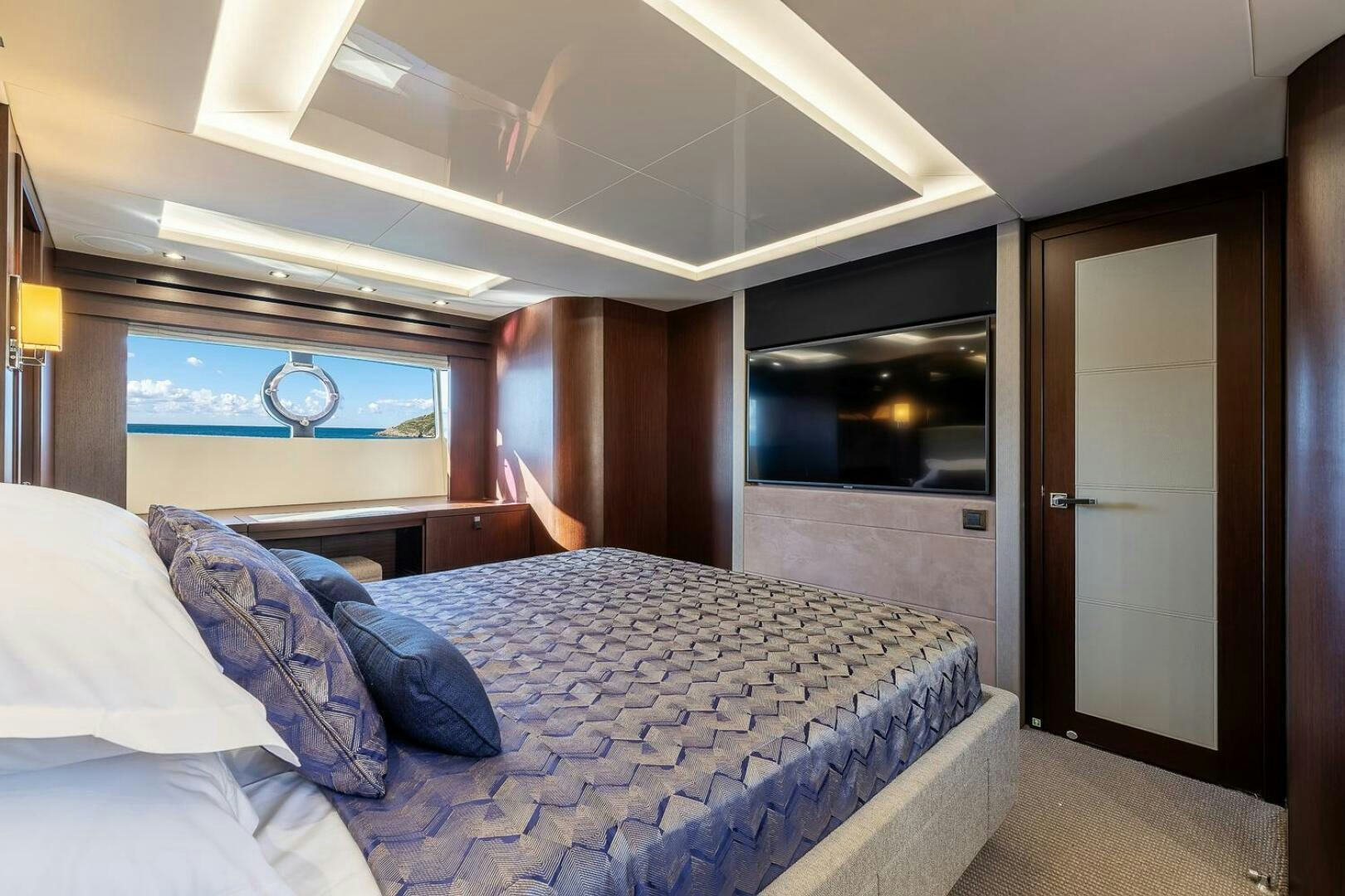 a bed in a room aboard INSOMNIA Yacht for Sale