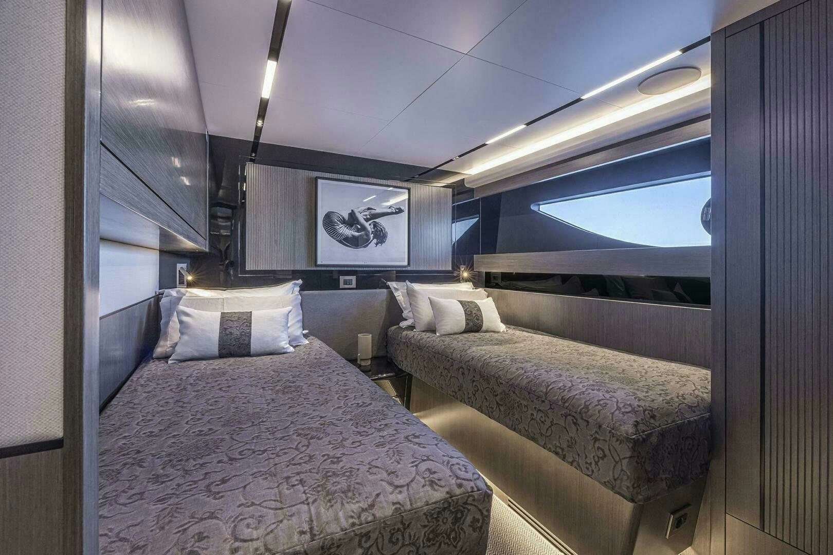 a couple of beds in a room aboard NONE Yacht for Sale