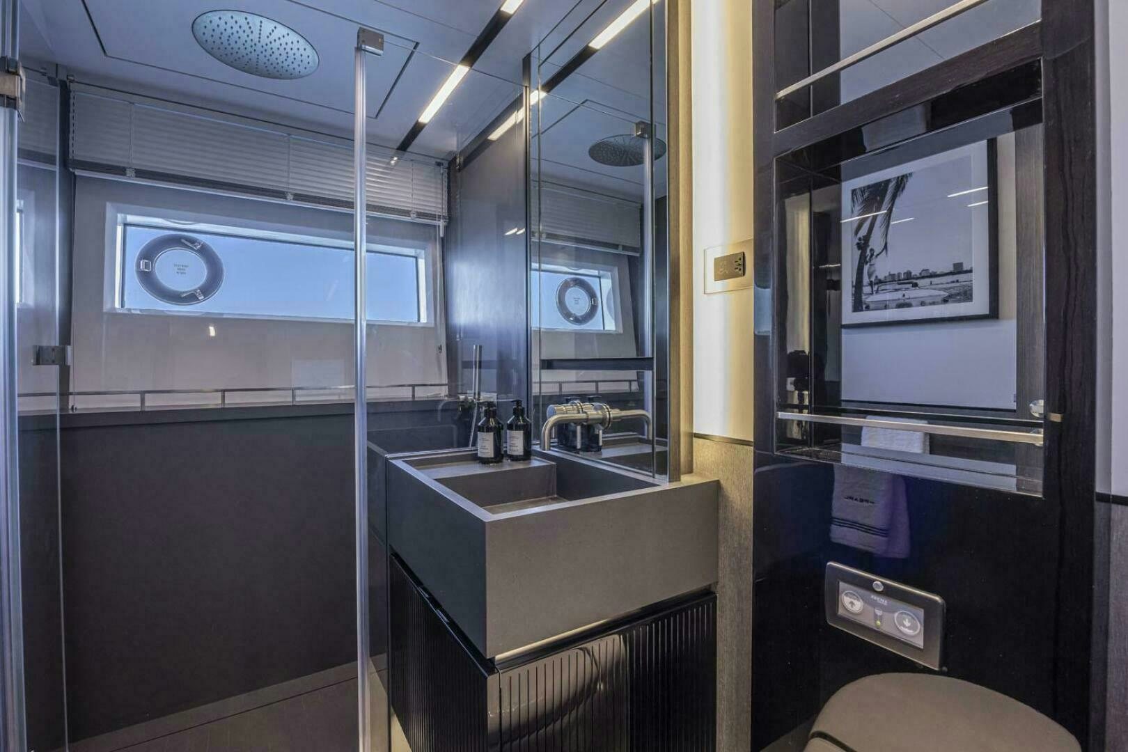 a bathroom with a sink and a mirror aboard NONE Yacht for Sale