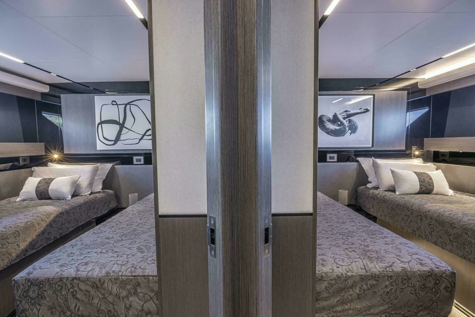 a room with two beds aboard NONE Yacht for Sale