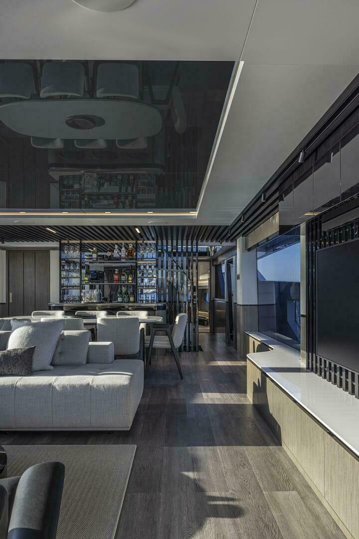 a room with a couch and a tv aboard NONE Yacht for Sale