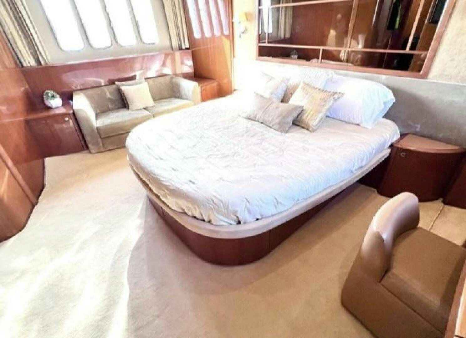 a bed in a hotel room aboard UNIQ Yacht for Sale