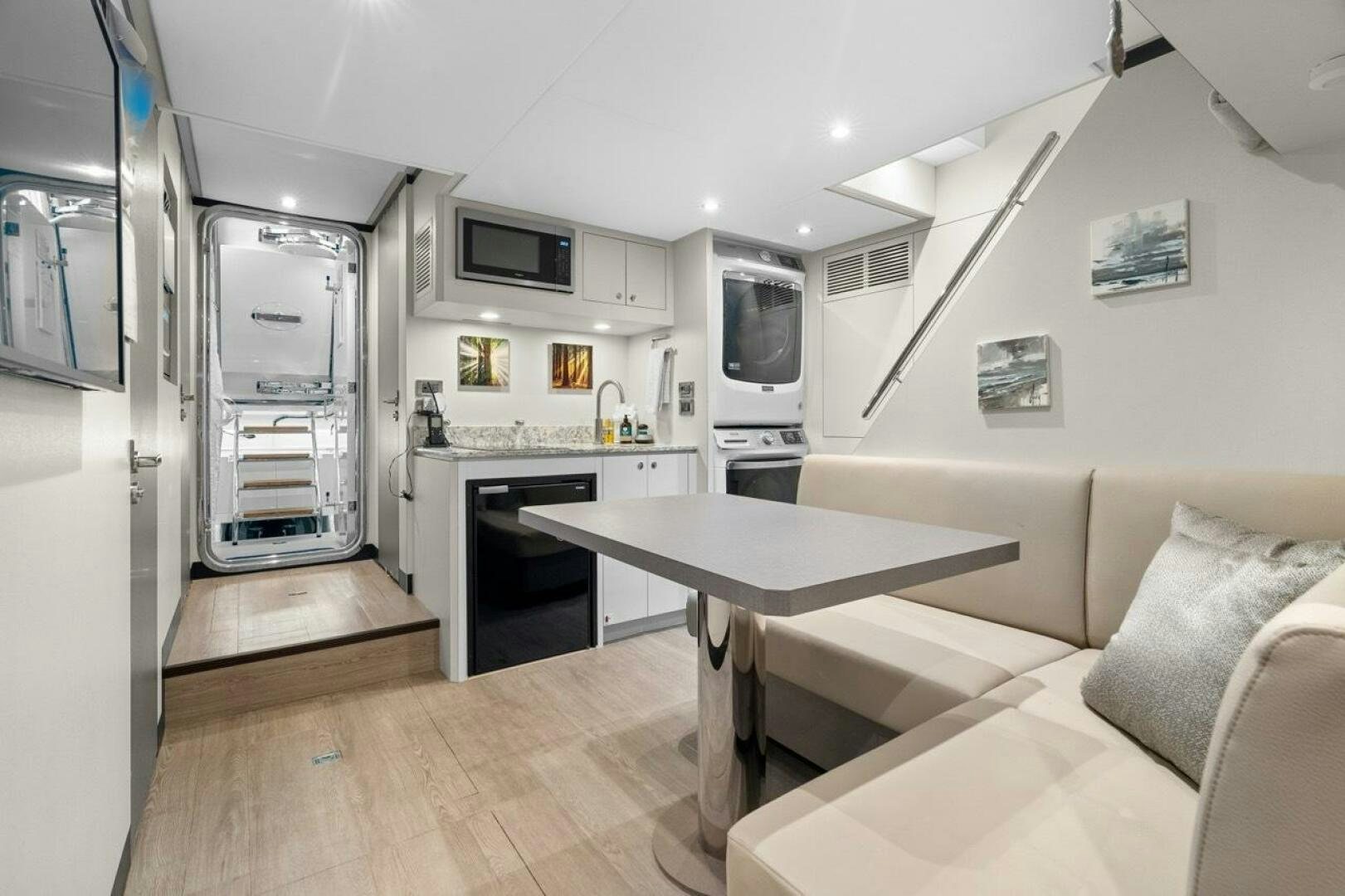 a kitchen and living room aboard LADY G Yacht for Sale