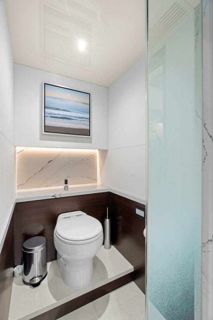 a toilet in a bathroom aboard LADY G Yacht for Sale