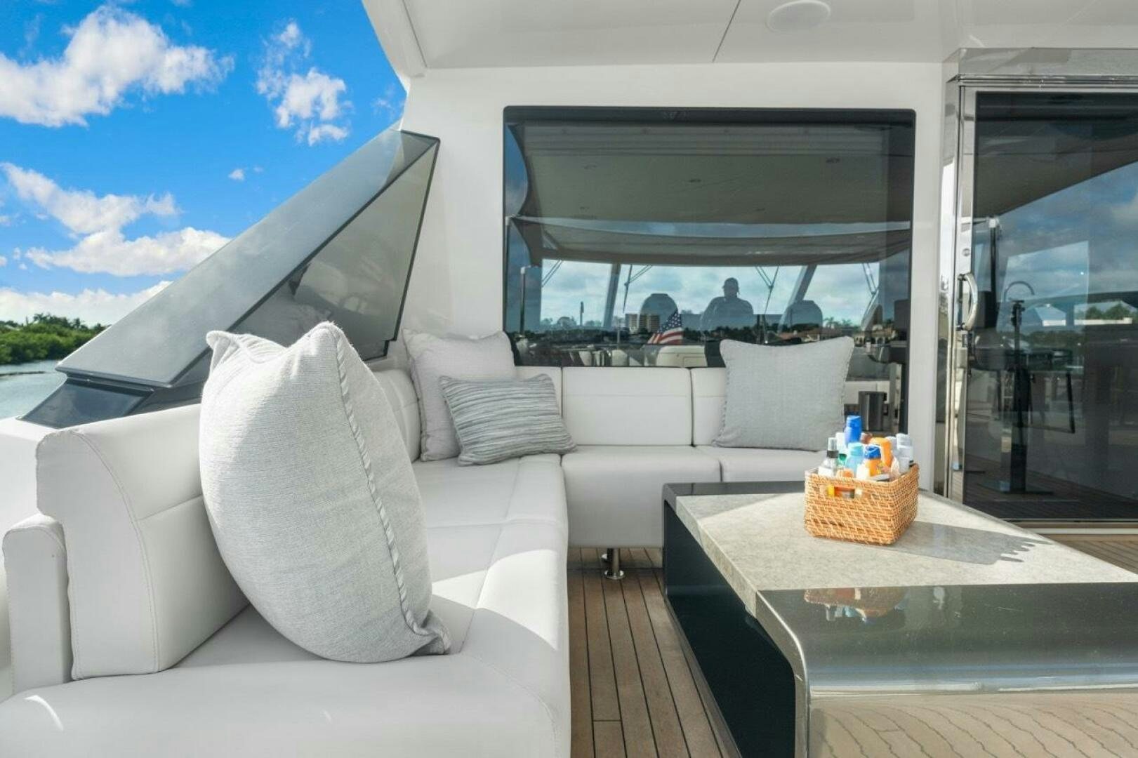 a living room with a large window aboard LADY G Yacht for Sale