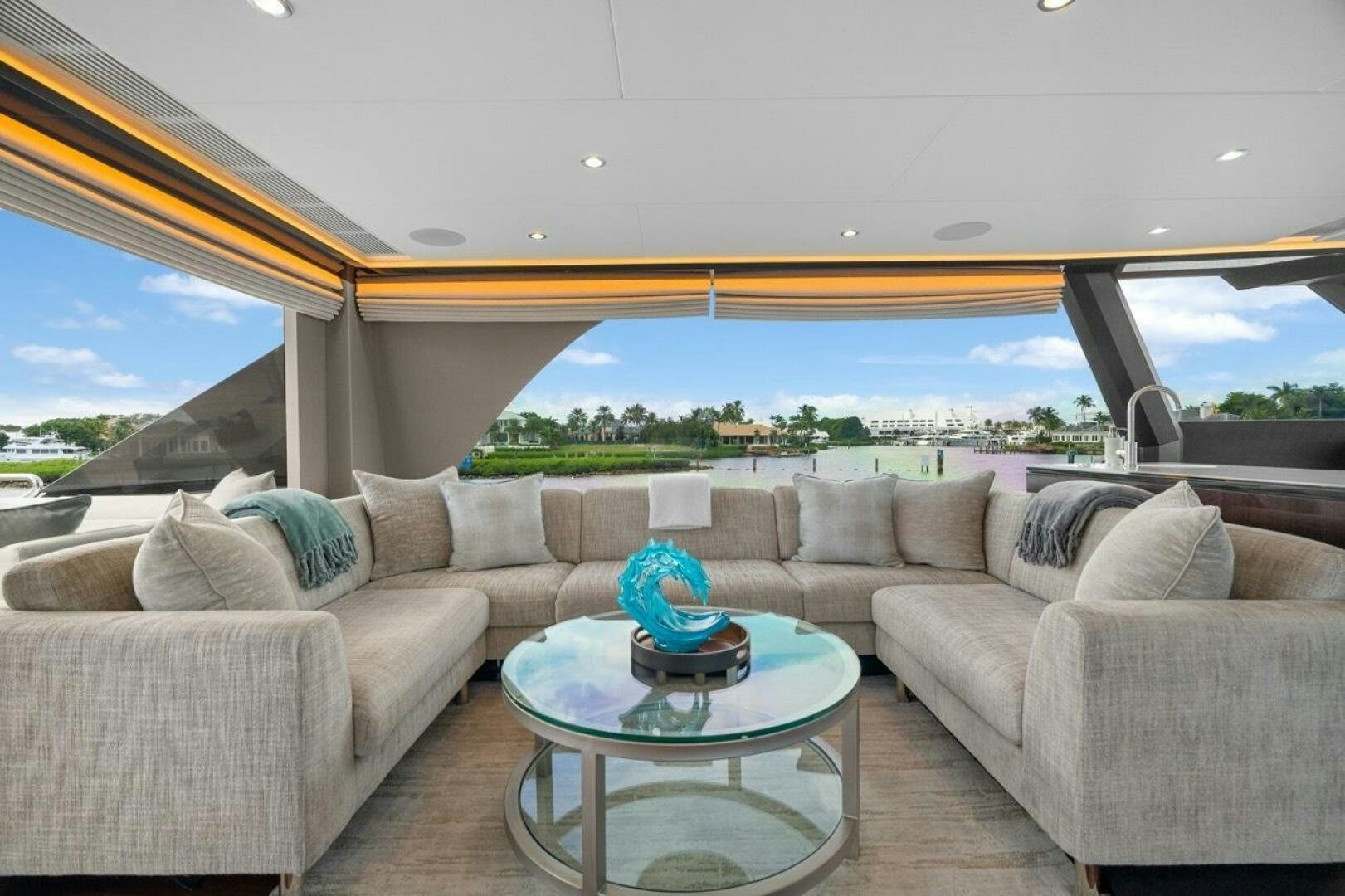 a couch with a coffee table aboard LADY G Yacht for Sale