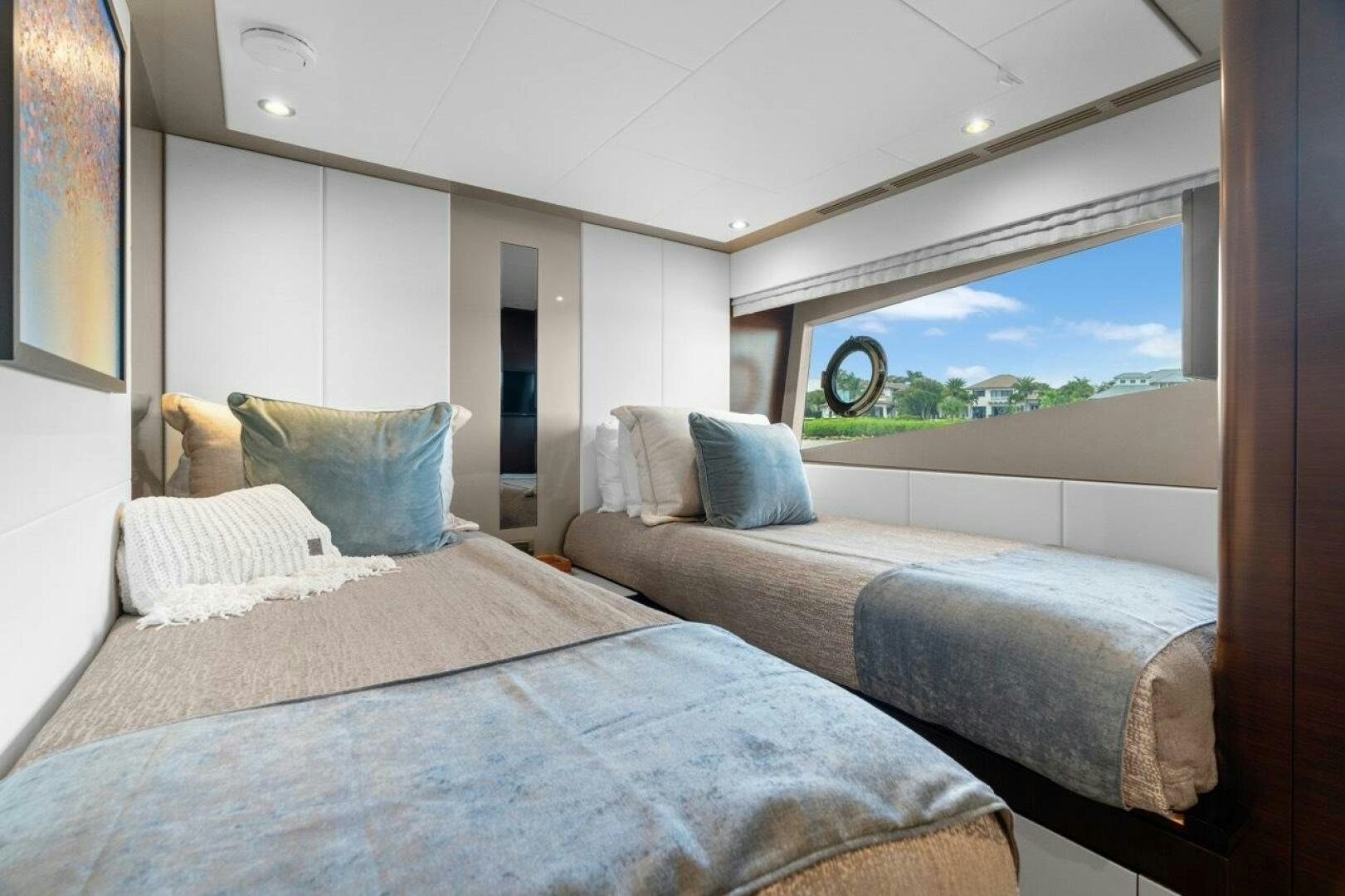 a couple of beds in a room aboard LADY G Yacht for Sale