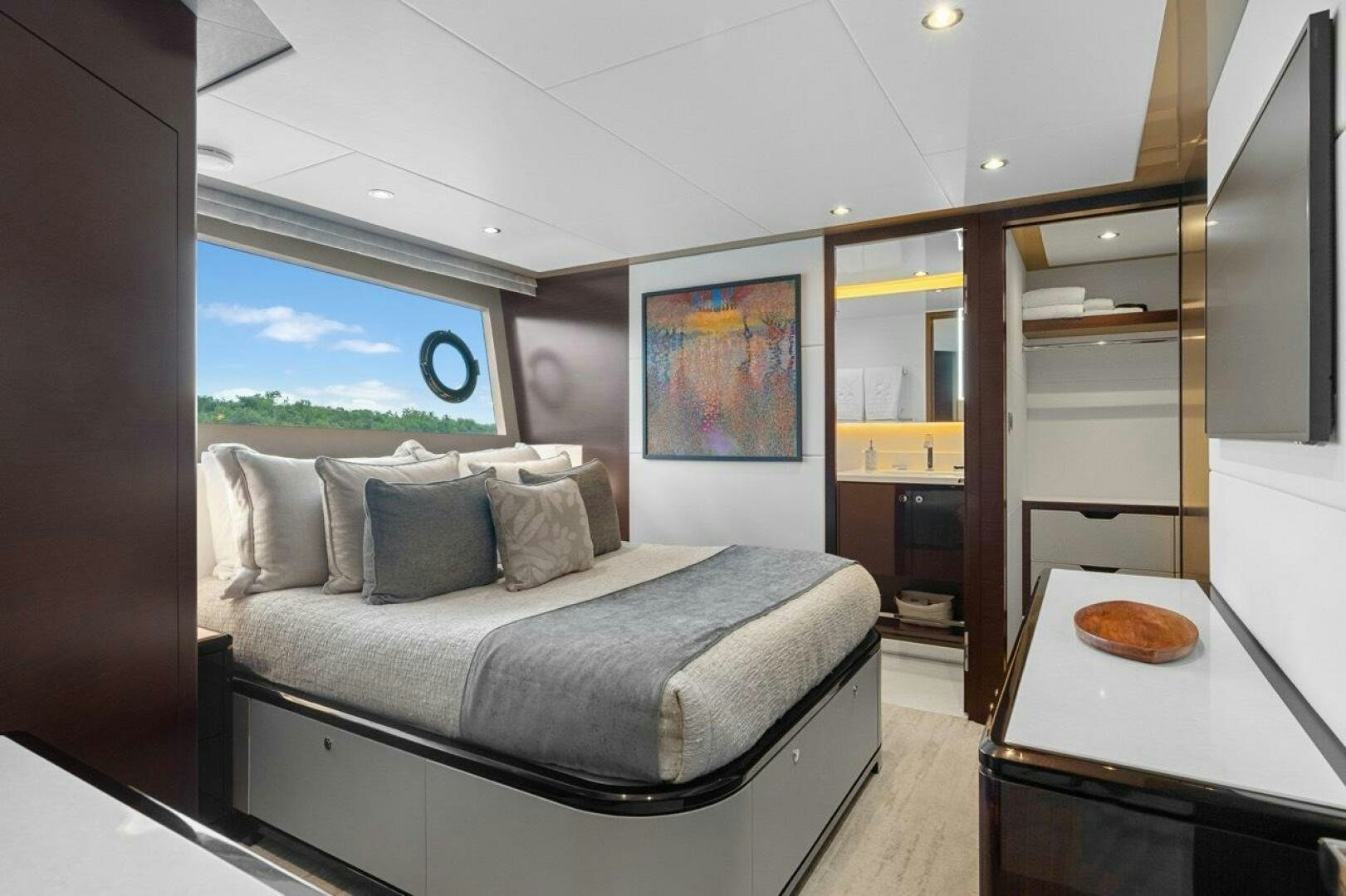 a bed in a room aboard LADY G Yacht for Sale