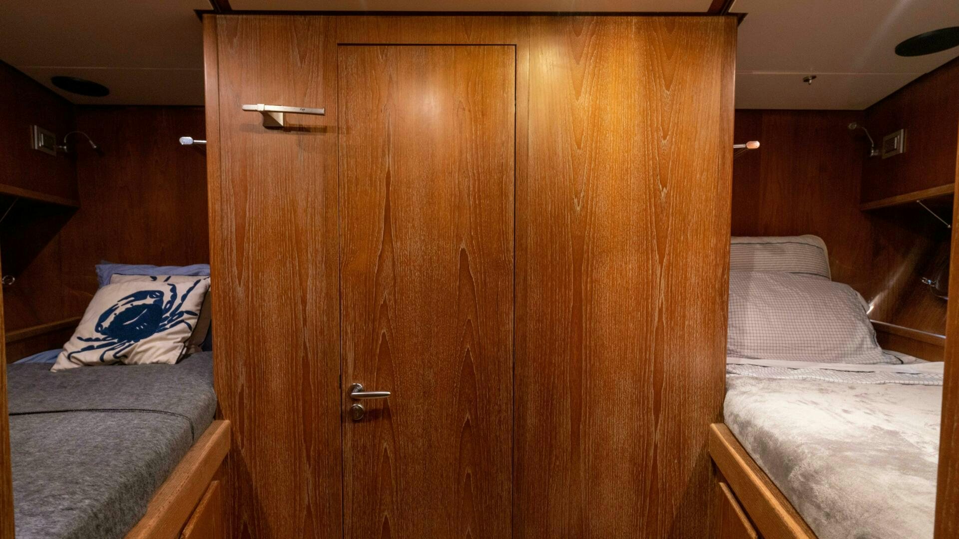 a wooden closet in a room aboard LOSAND Yacht for Sale