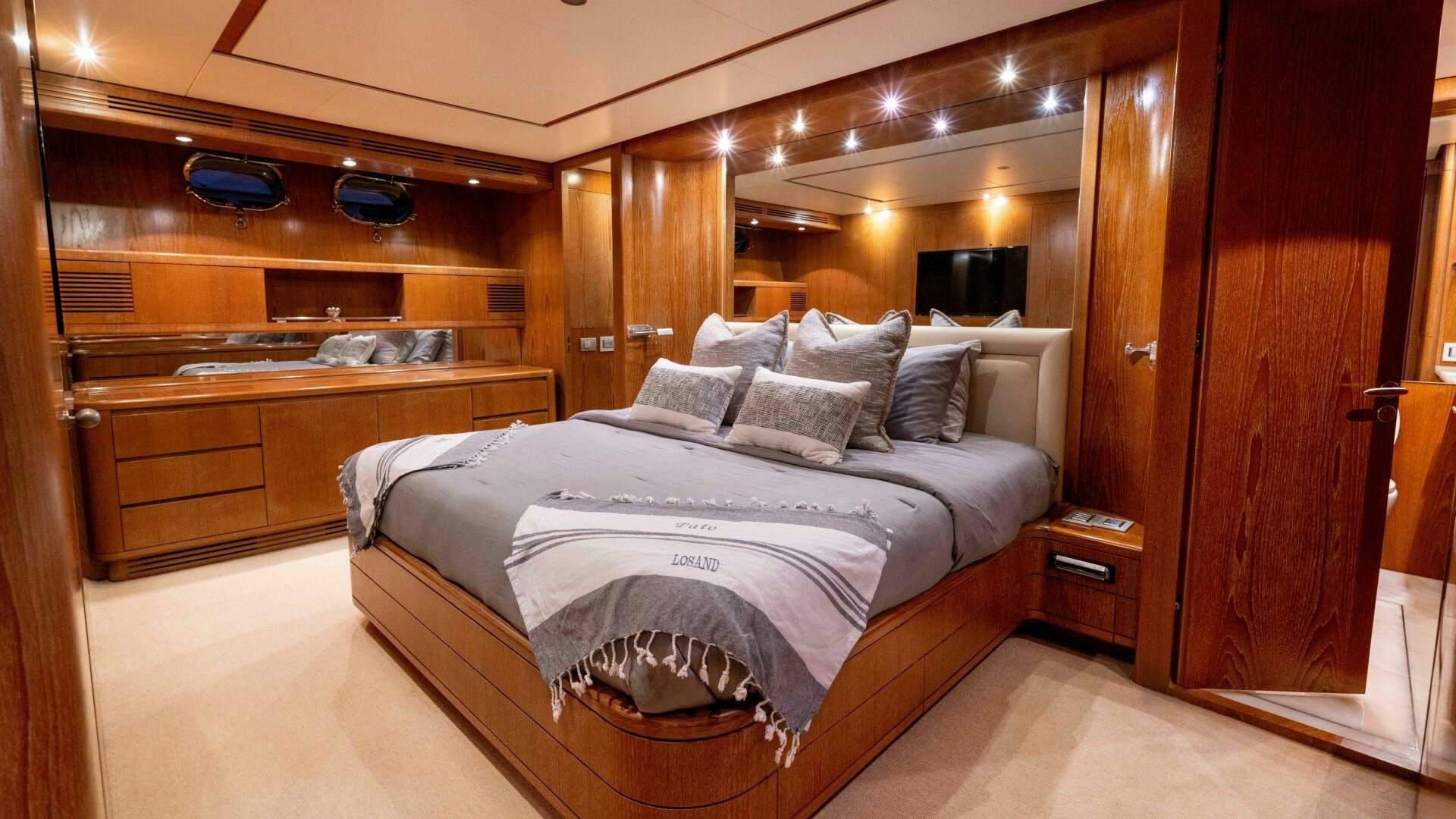 a bed in a room aboard LOSAND Yacht for Sale