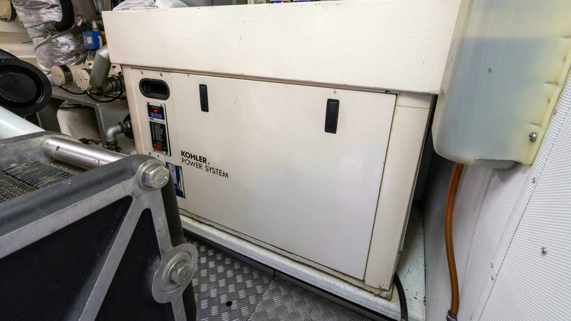 a white rectangular box with a black object on top aboard LOSAND Yacht for Sale