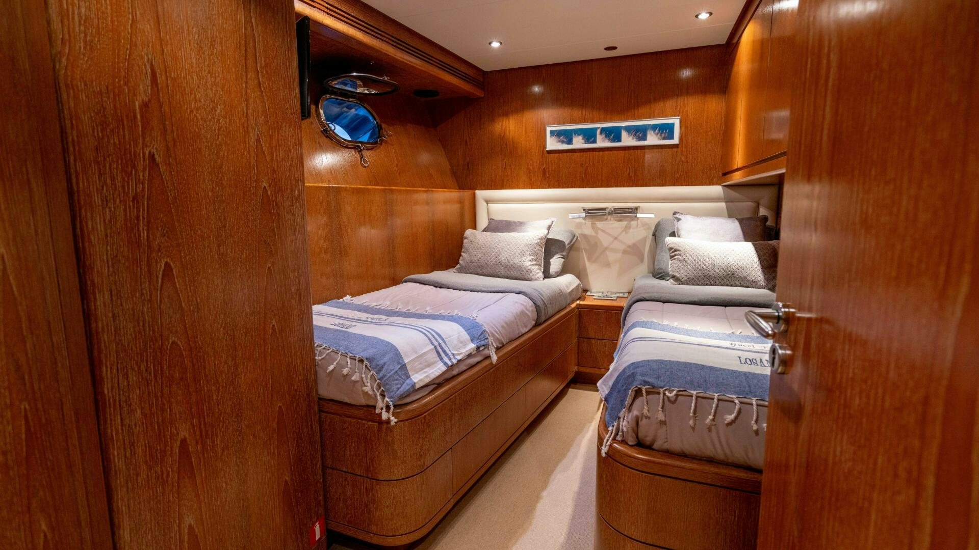 a room with two beds aboard LOSAND Yacht for Sale