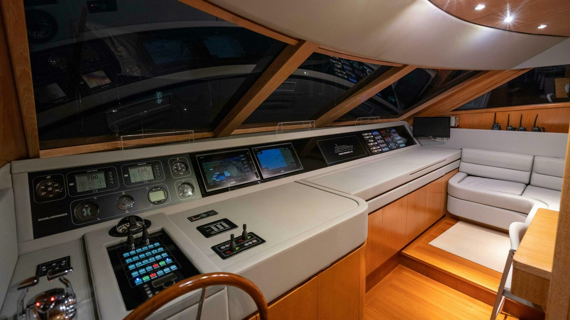 a room with a large white machine and a few screens aboard LOSAND Yacht for Sale