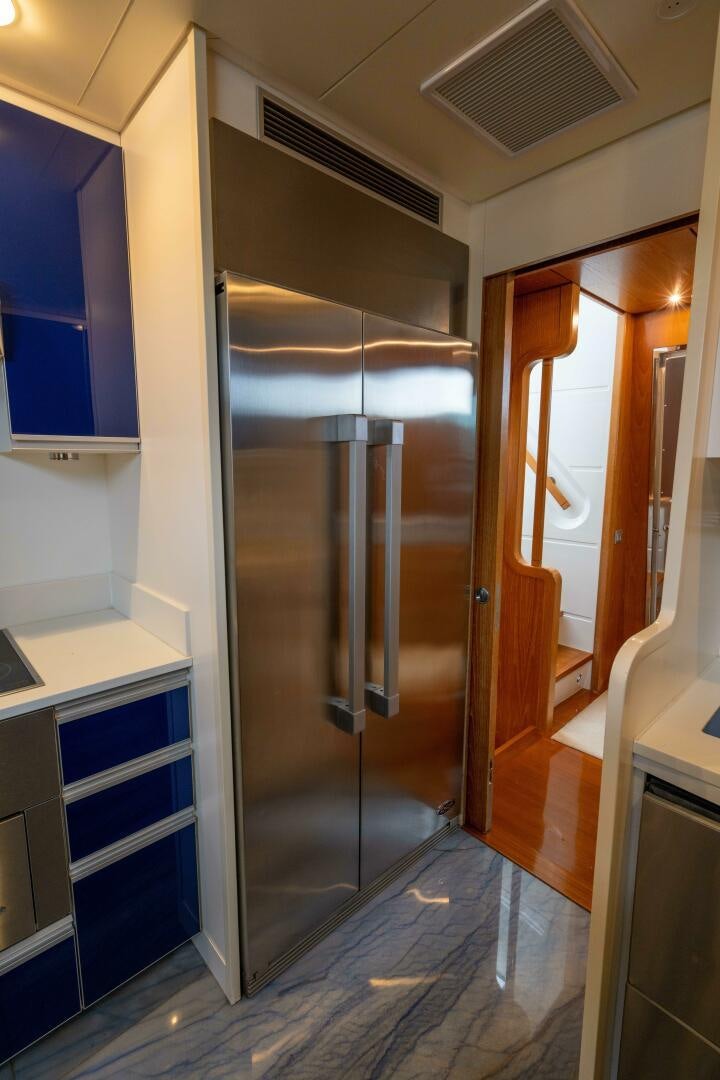 a large metal door in a room aboard LOSAND Yacht for Sale