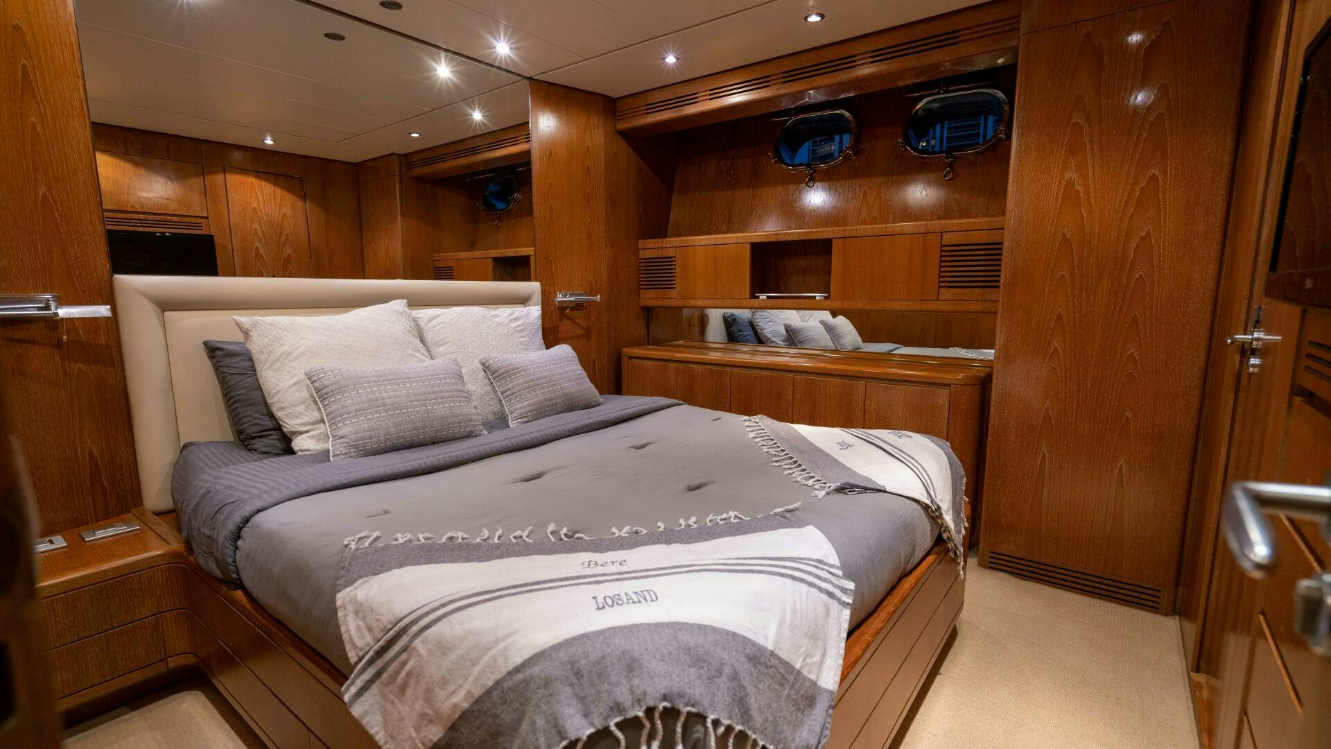 a bed in a room aboard LOSAND Yacht for Sale