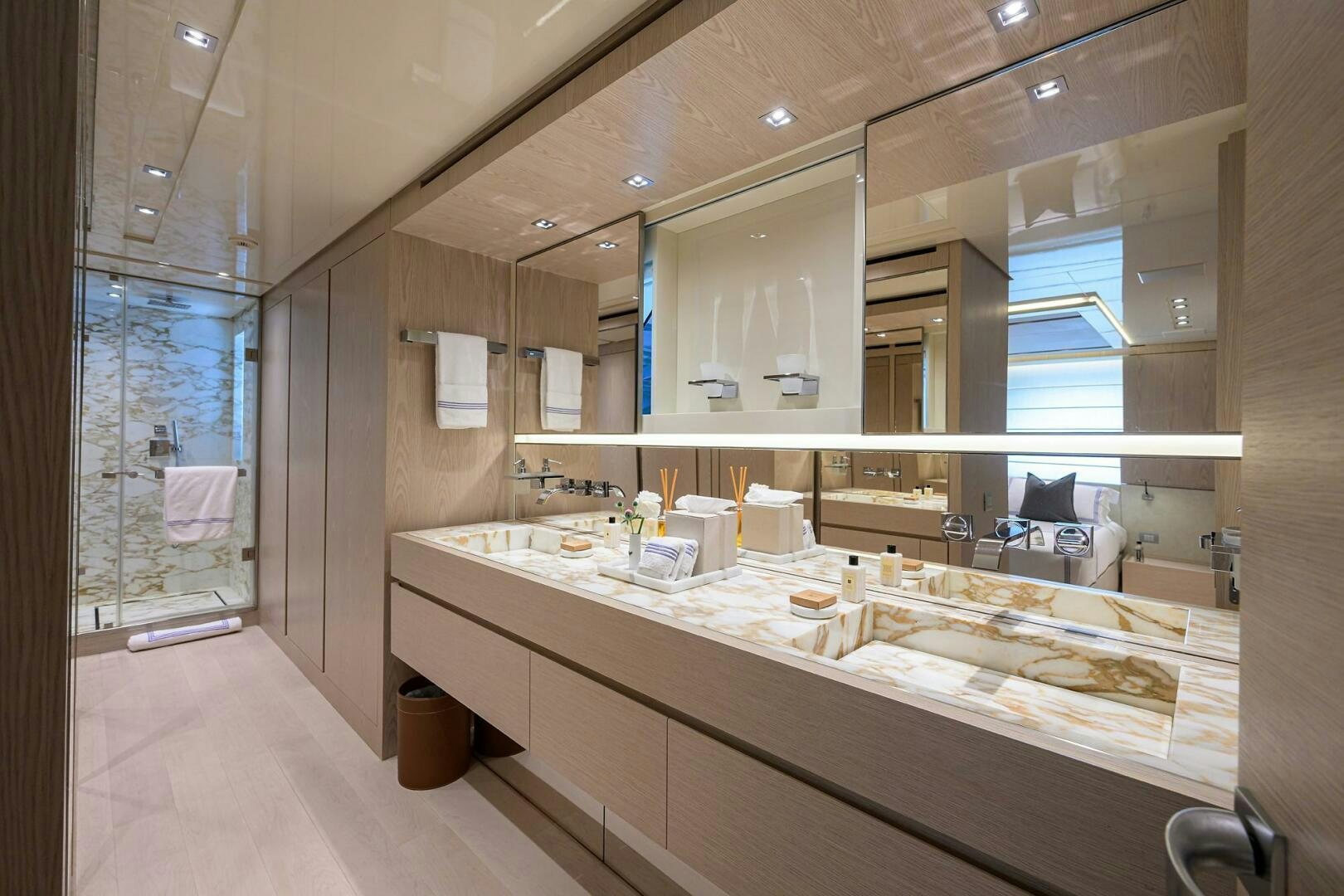 a bathroom with a large mirror aboard GLORY Yacht for Sale