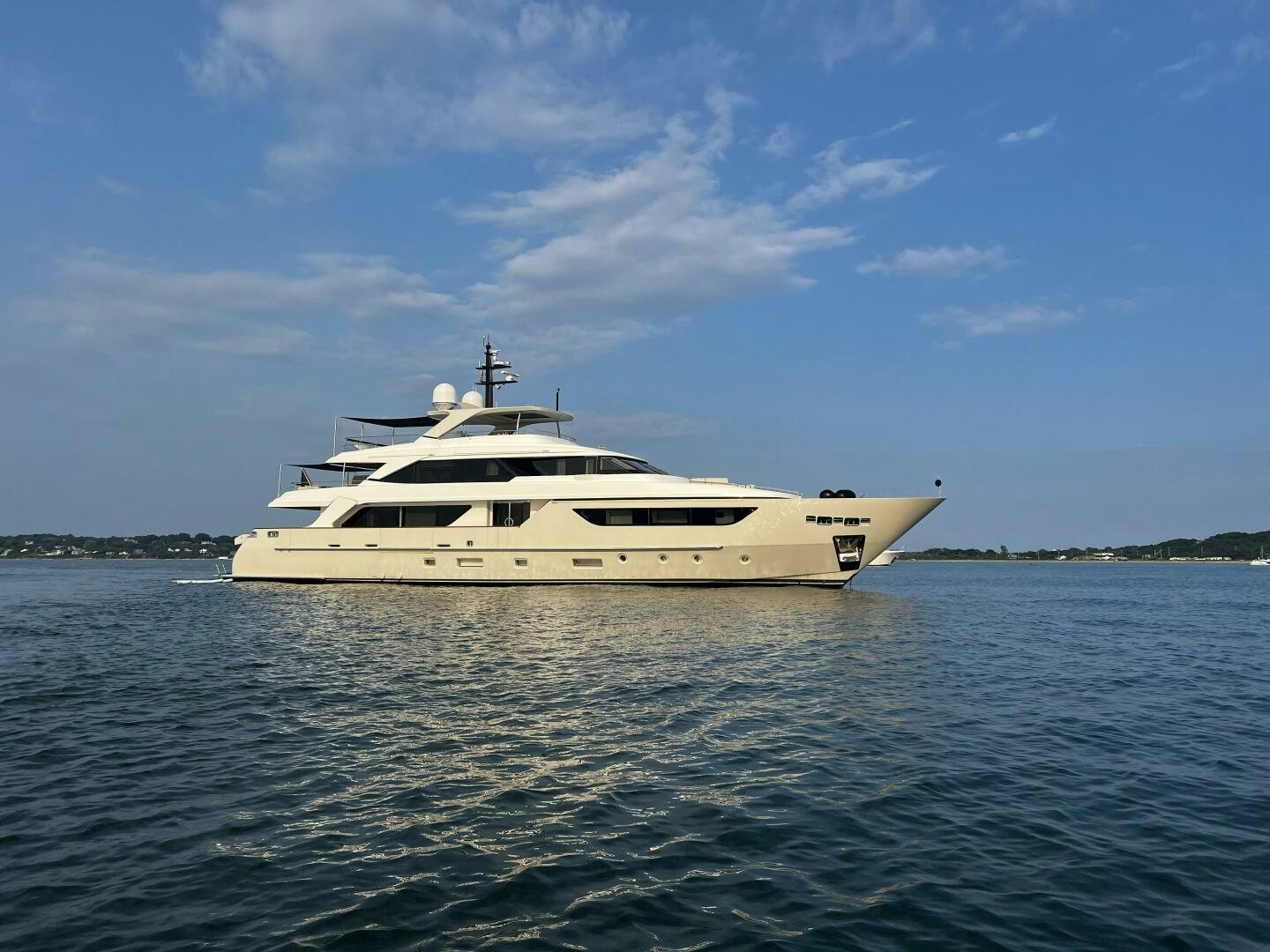 a white boat in the water aboard GLORY Yacht for Sale