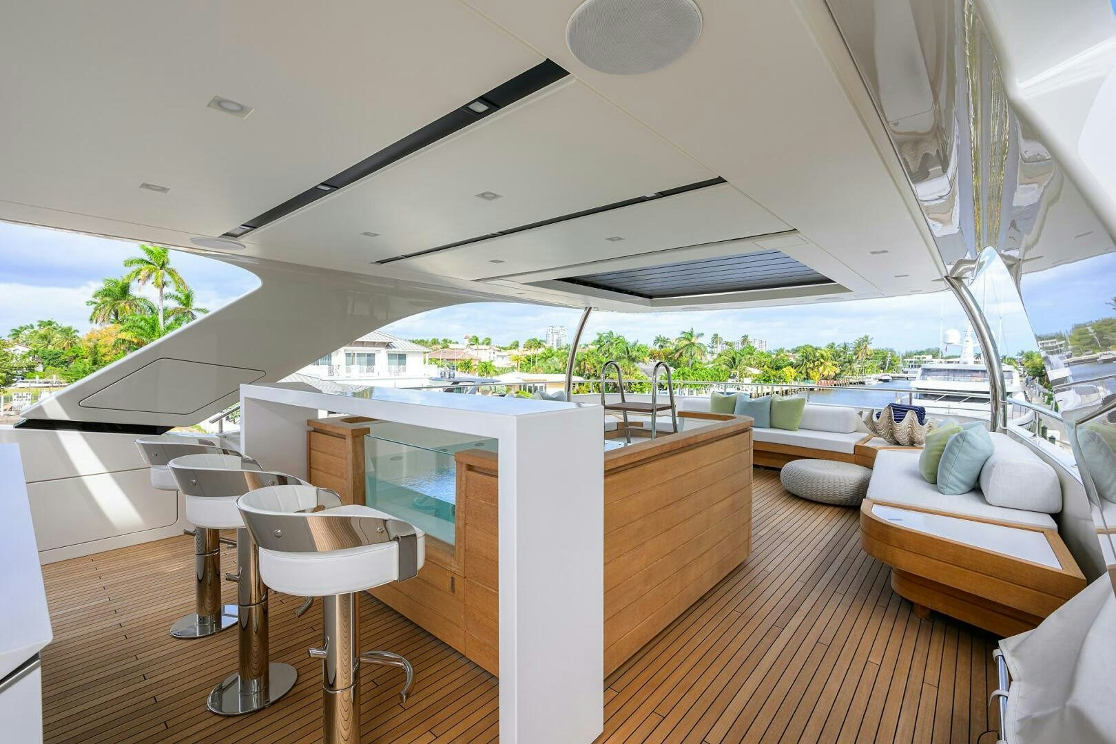 a room with a table and chairs aboard GLORY Yacht for Sale