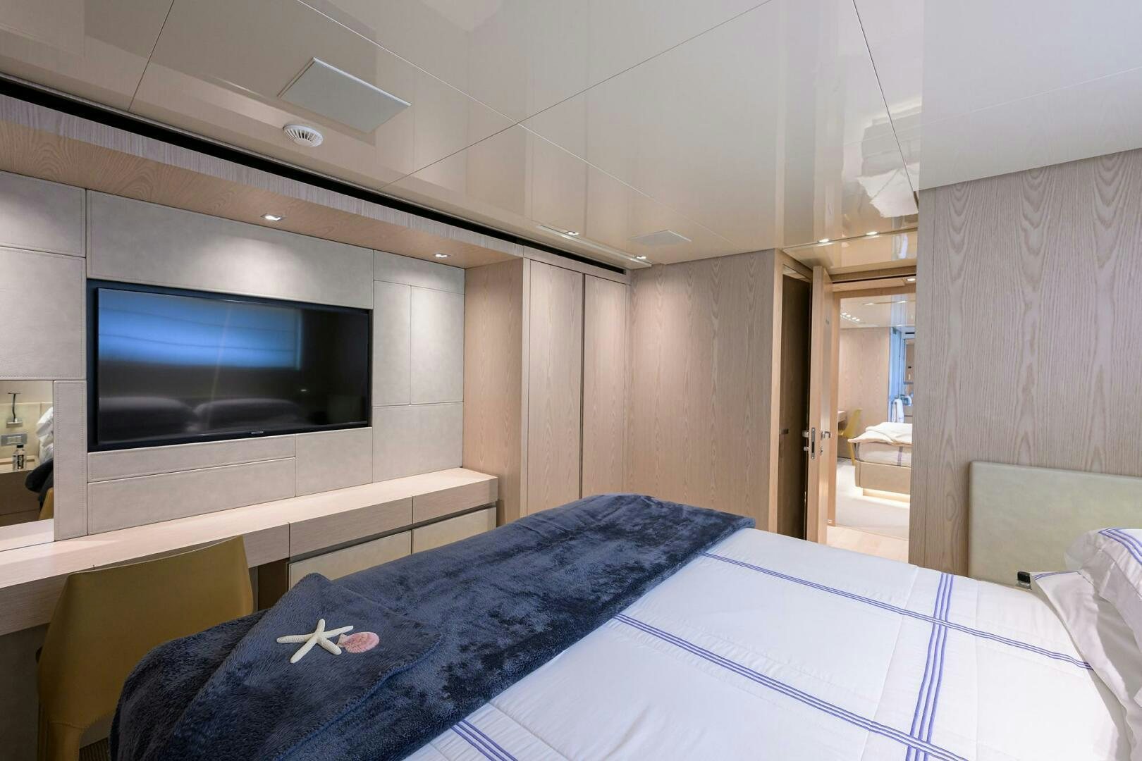 a bed in a room aboard GLORY Yacht for Sale
