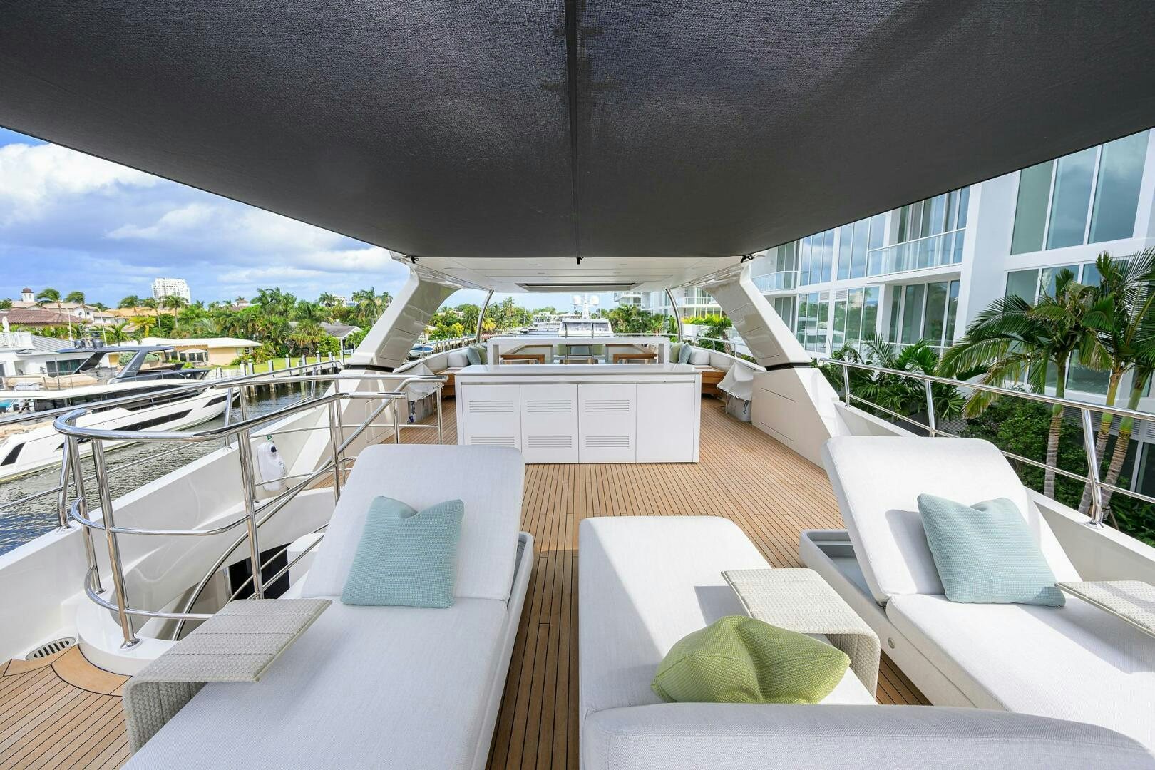 a patio with a table and chairs aboard GLORY Yacht for Sale