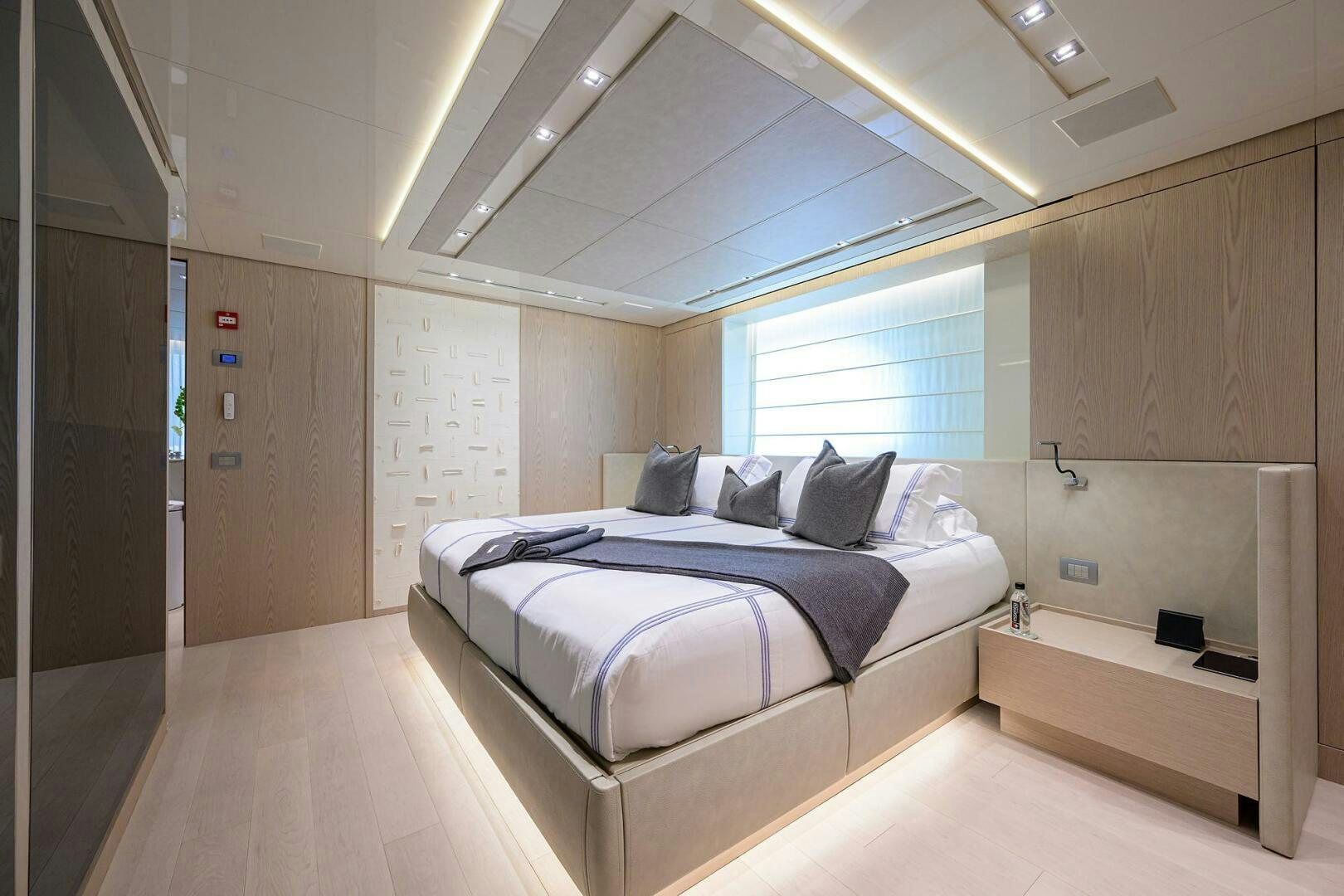 a bed in a room aboard GLORY Yacht for Sale