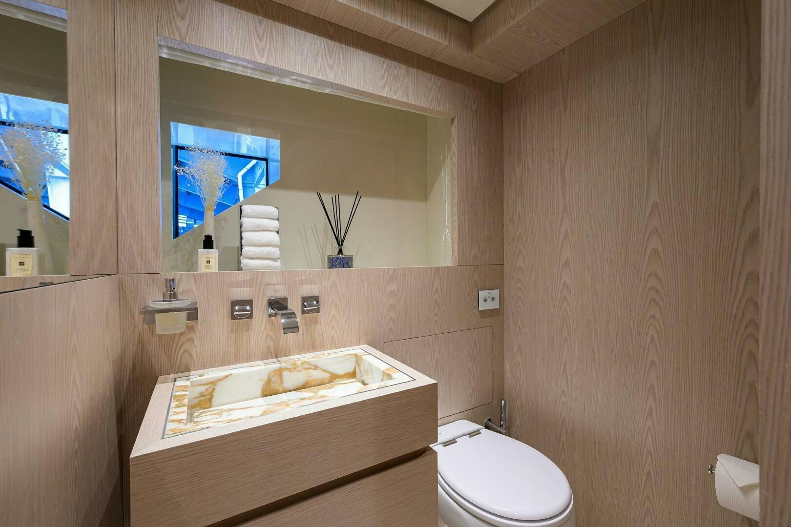 a bathroom with a sink and a toilet aboard GLORY Yacht for Sale