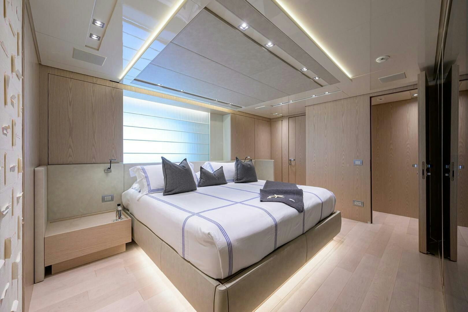 a bed in a room aboard GLORY Yacht for Sale