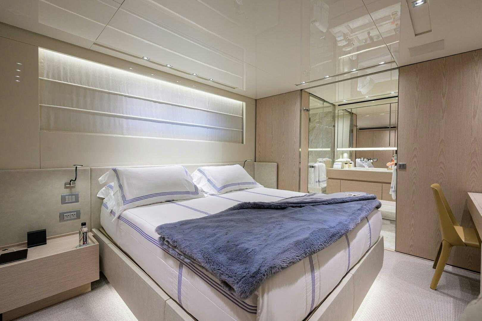 a bed in a room aboard GLORY Yacht for Sale