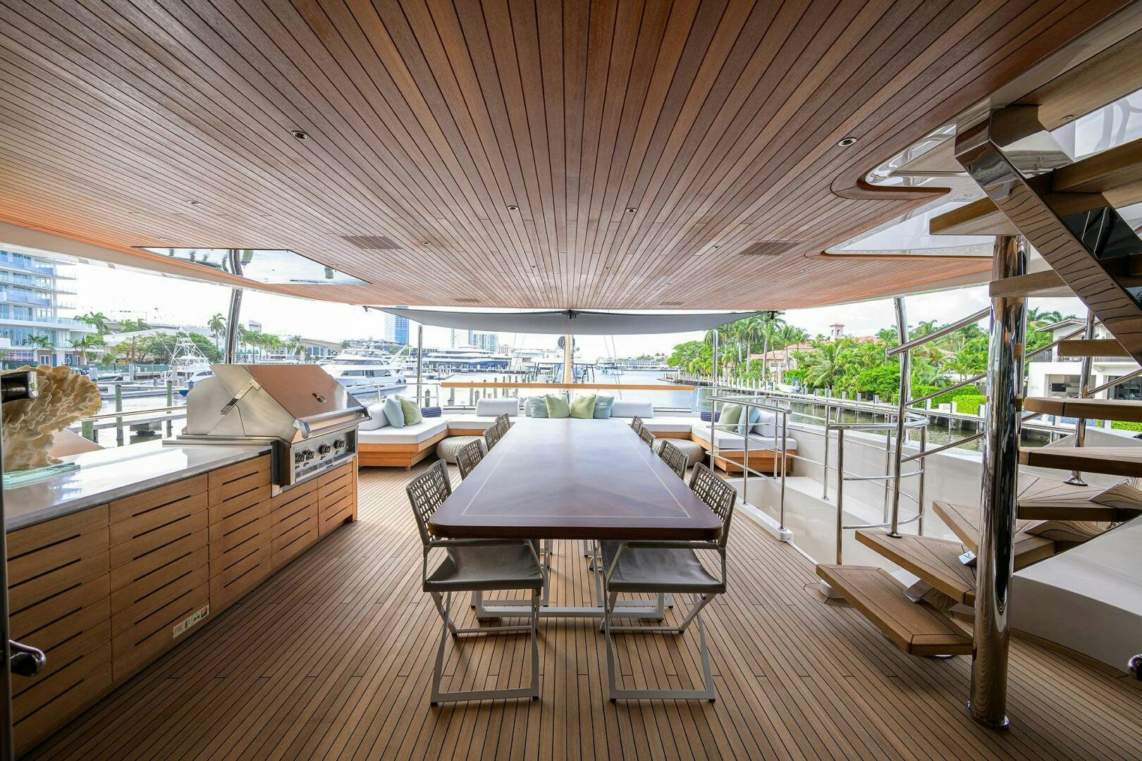 a wood table in a room aboard GLORY Yacht for Sale