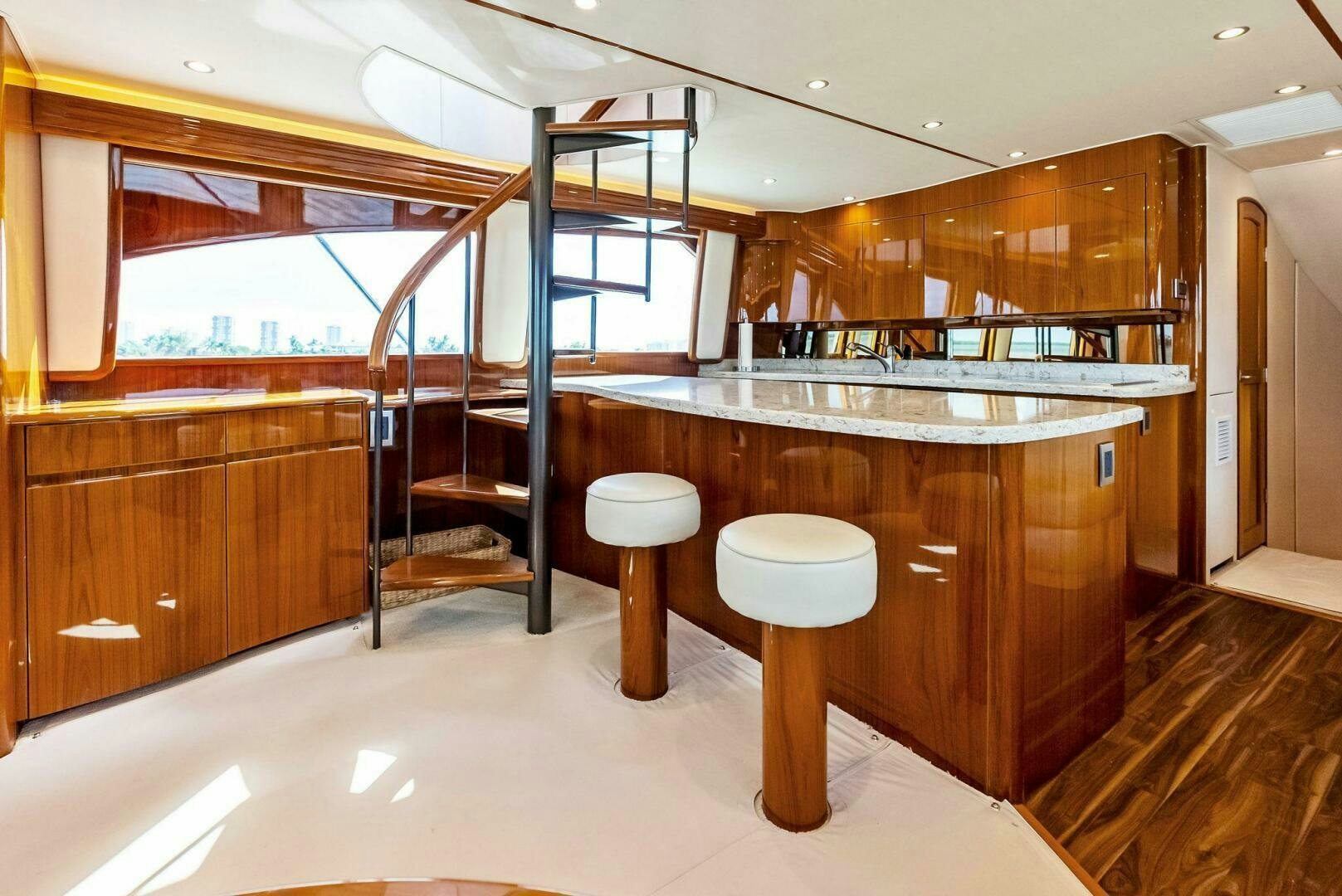 a bathroom with a large bar and a ladder aboard PRINCESS LILY Yacht for Sale