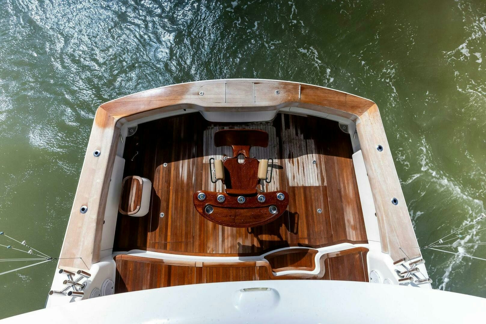 a small wooden boat in a small wooden boat aboard PRINCESS LILY Yacht for Sale