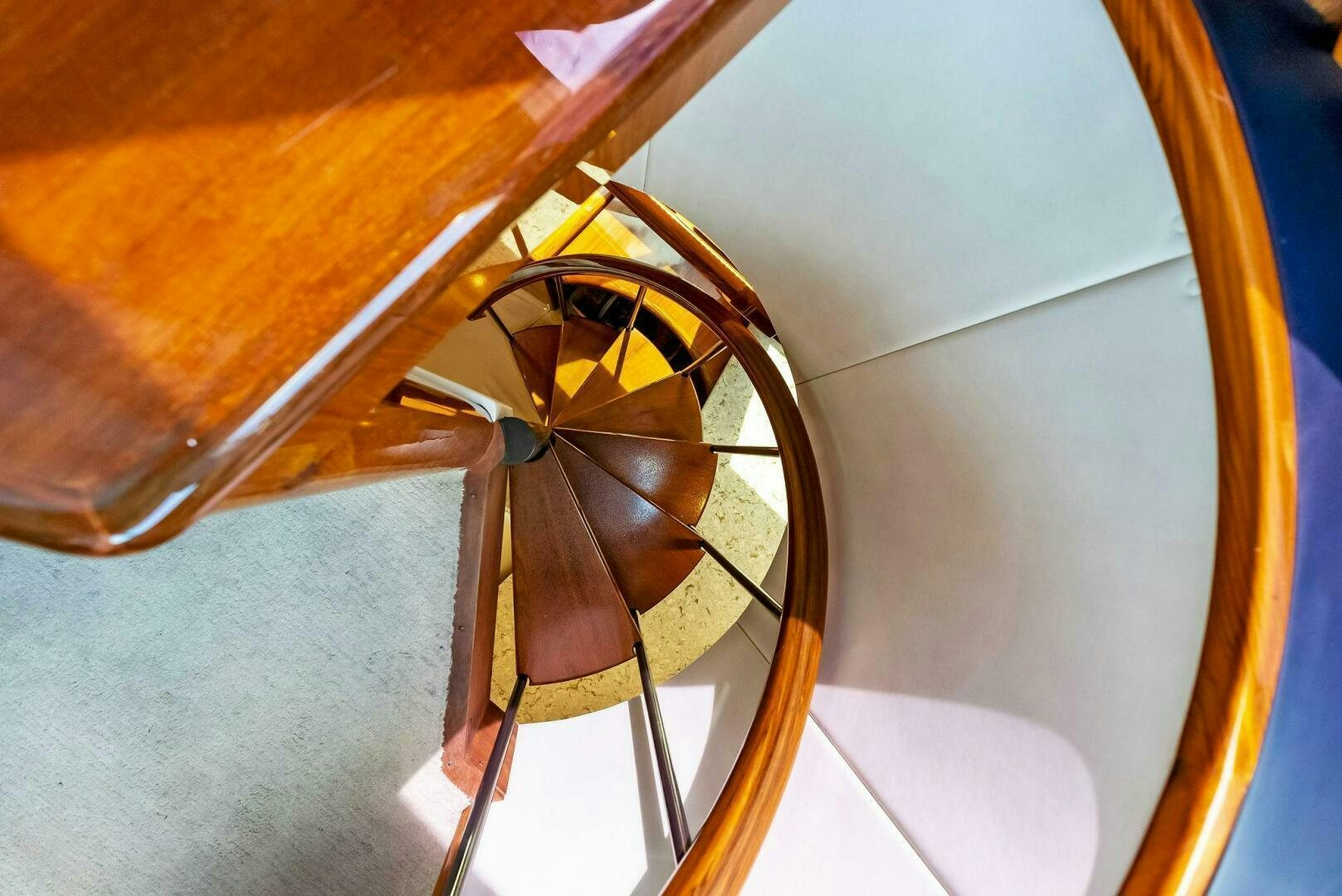 a wooden wheel with a wooden frame aboard PRINCESS LILY Yacht for Sale