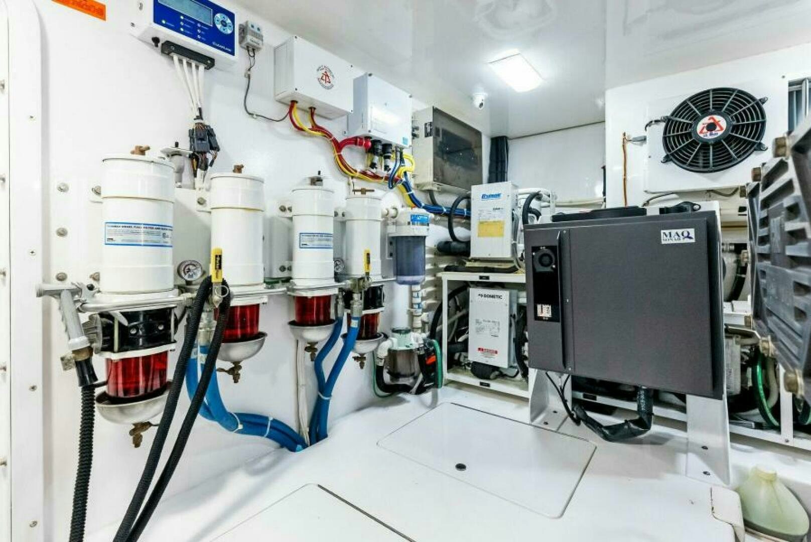 a room with machinery and equipment aboard PRINCESS LILY Yacht for Sale