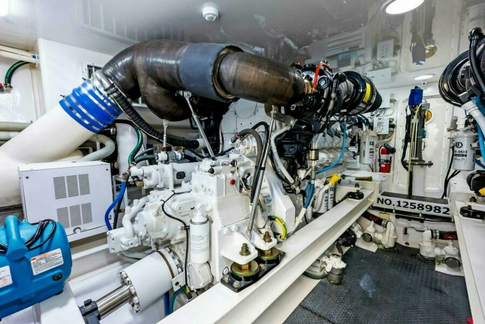 a machine with a large pipe aboard PRINCESS LILY Yacht for Sale