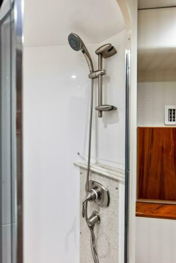 a shower with a glass door aboard PRINCESS LILY Yacht for Sale