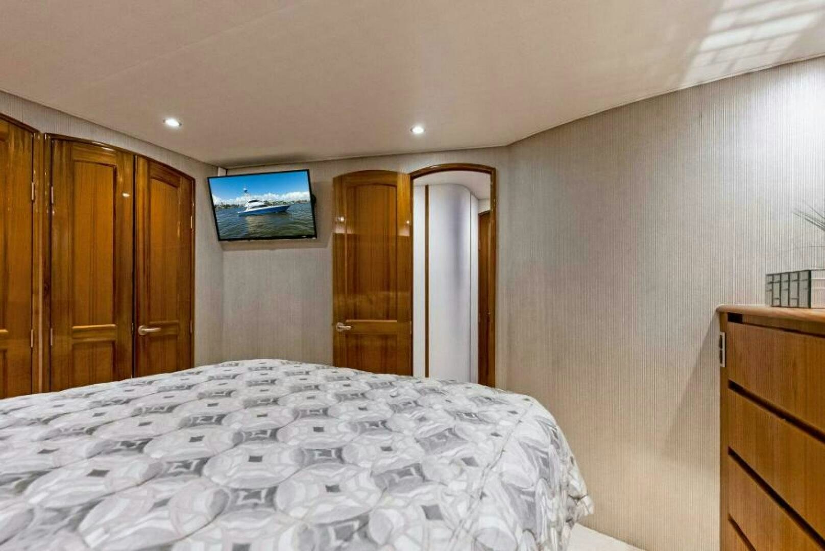 a bed in a room aboard PRINCESS LILY Yacht for Sale