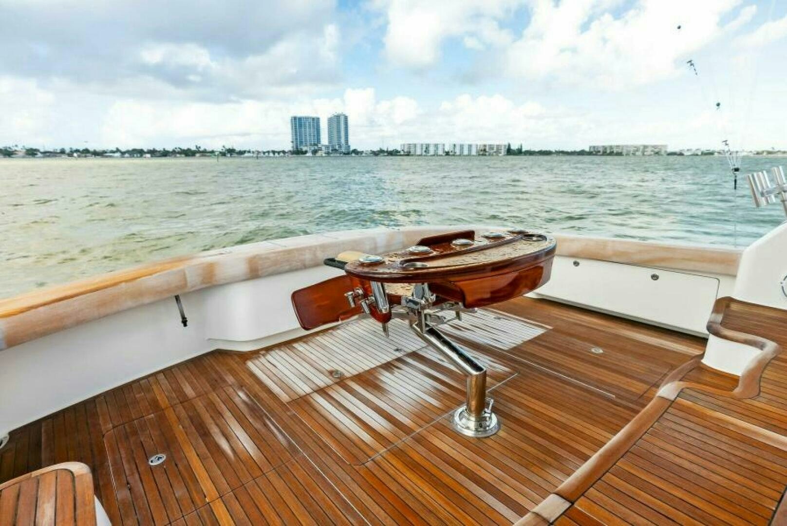 a boat on a deck overlooking a city aboard PRINCESS LILY Yacht for Sale