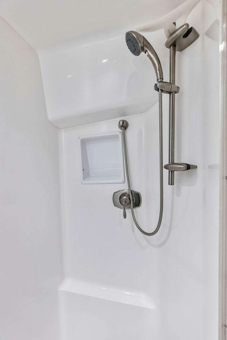 a shower with a glass door aboard PRINCESS LILY Yacht for Sale
